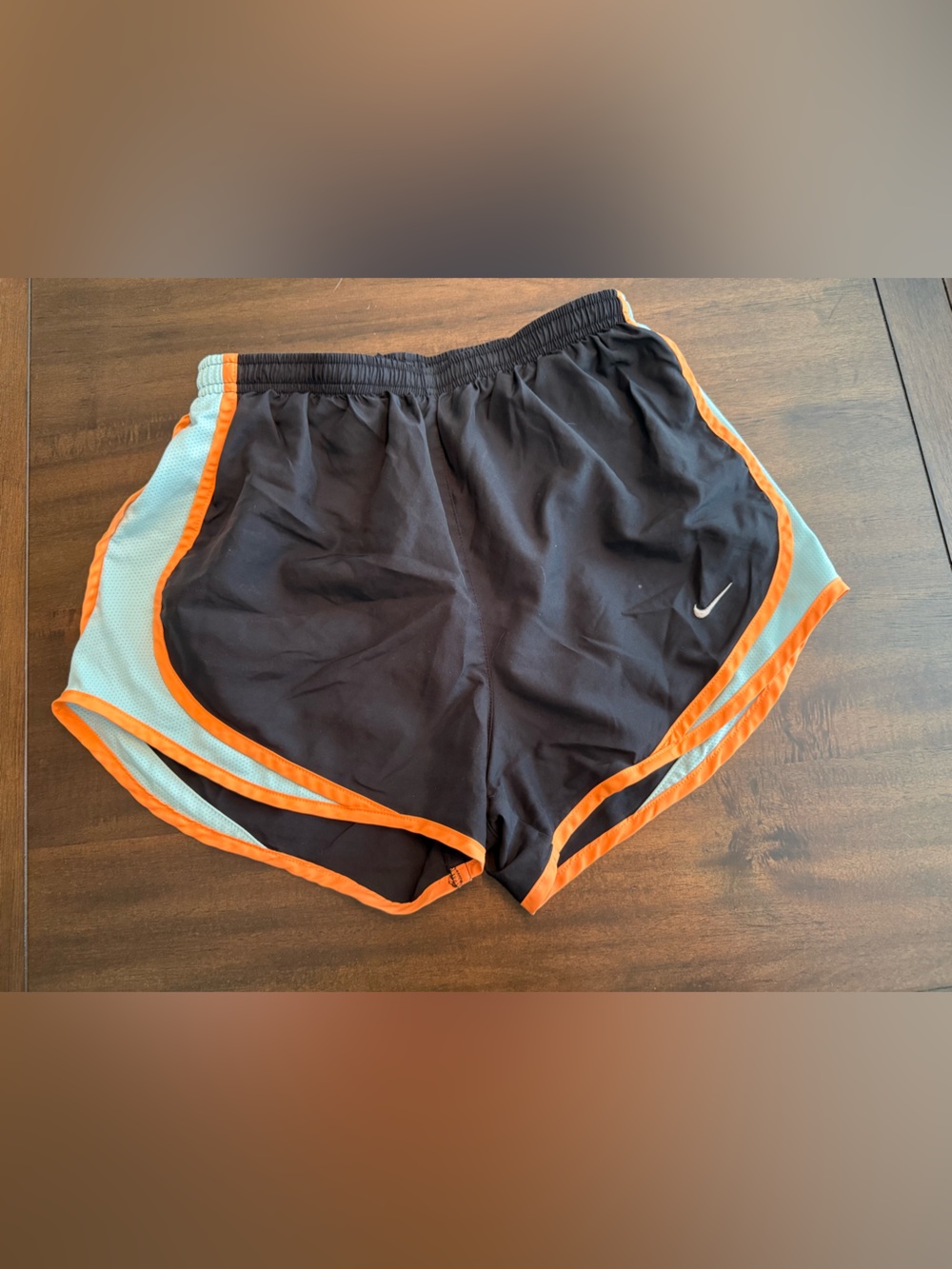 NIKE: Womens Black Running Shorts with Orange Trim
